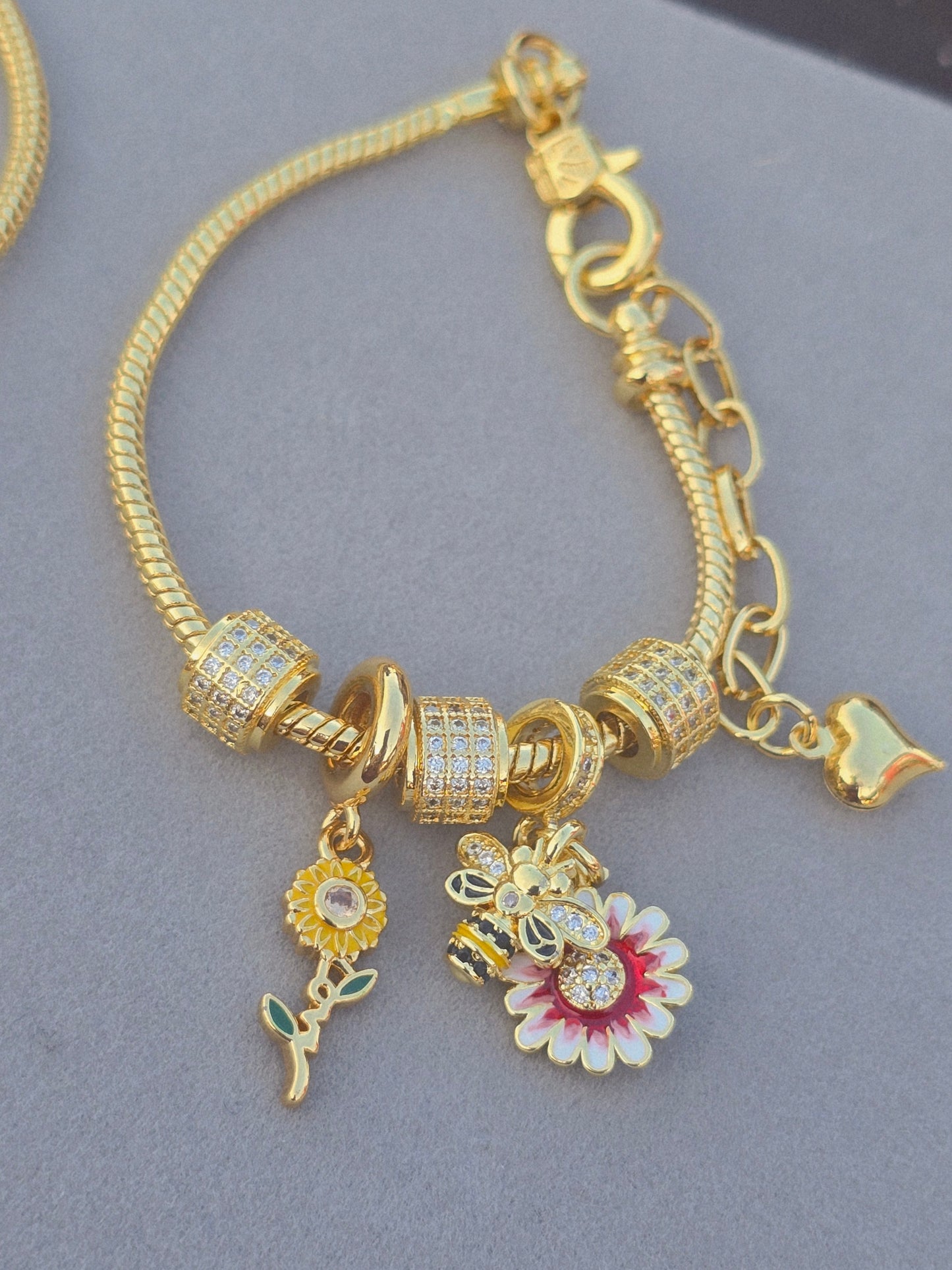 Pulsera con dijes evil eyes tuercas turca abrigas y flor evilbeyes bracelets charms flowers and bees