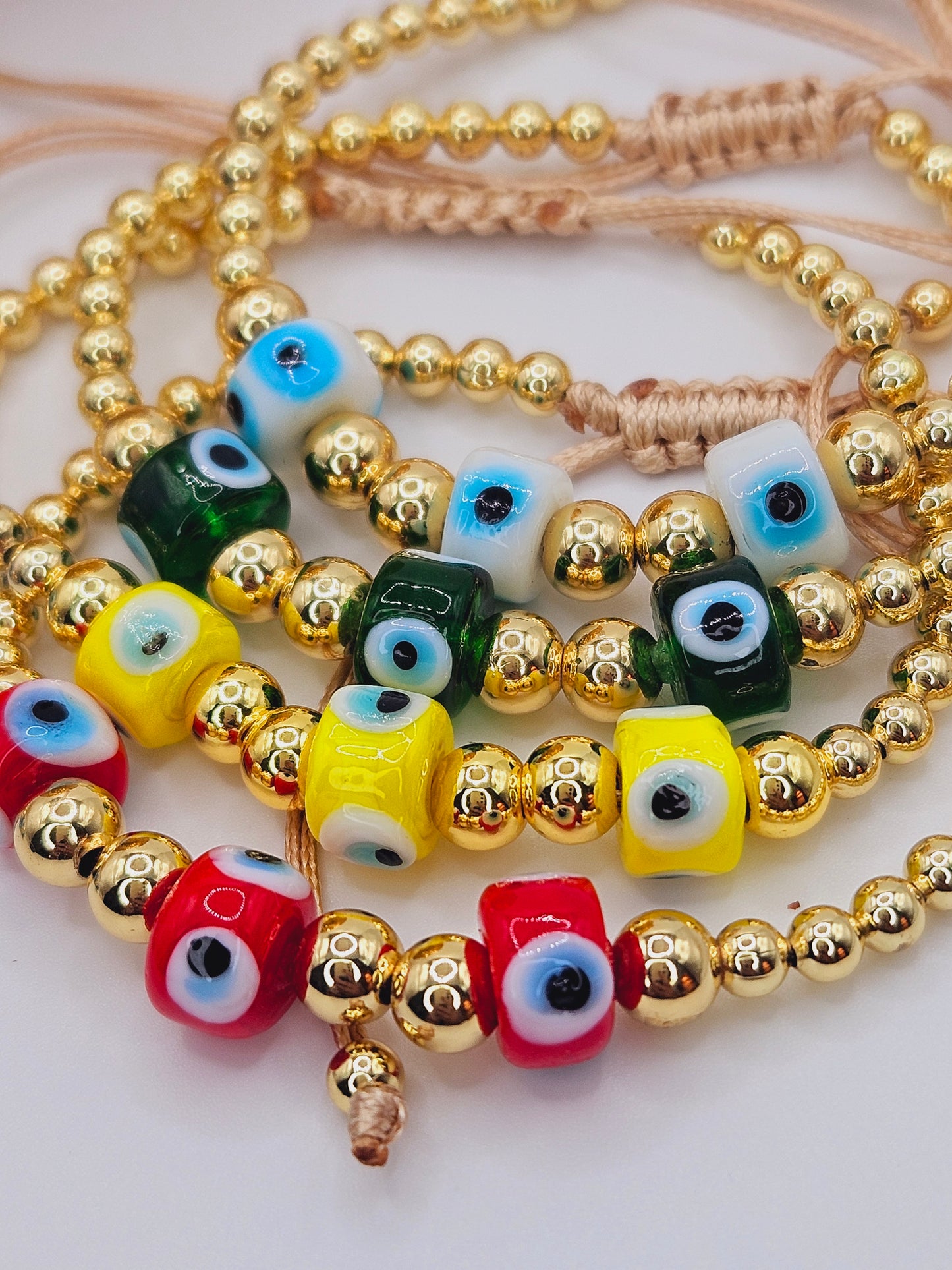 Triple pendant evil eyes beaded bracelet