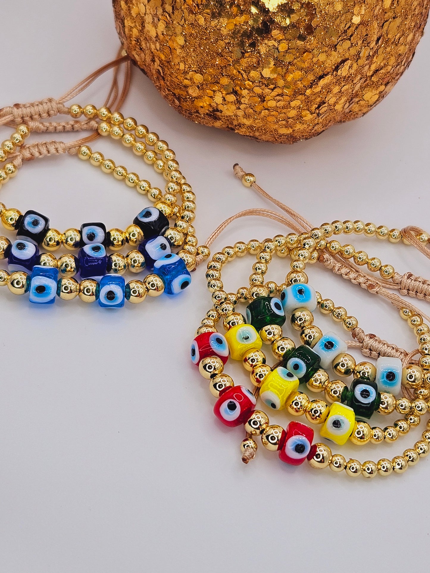 Triple pendant evil eyes beaded bracelet