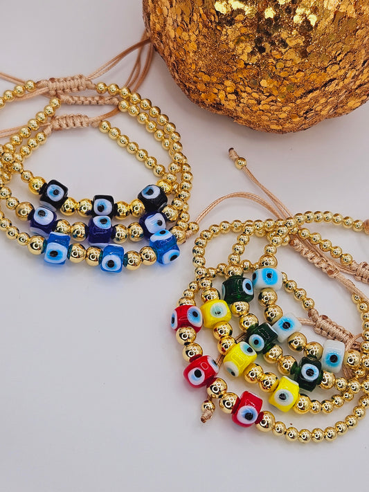 Triple pendant evil eyes beaded bracelet