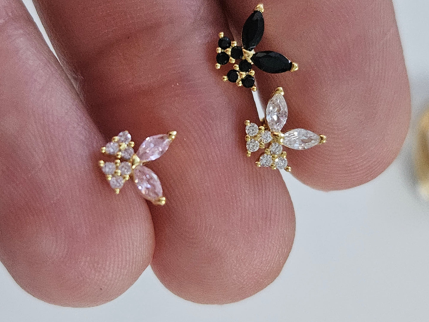 Crystal butterfly ear-piercing